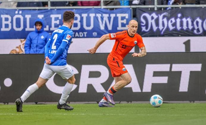 GER, Darmstadt, SV Darmstadt 98 vs SC Paderborn, 2 Bundesliga, Football, DFB, Season 2024 2025, Merck Stadion am Böllenfalltor, Matchday 19, pictured from l Sergio Lopez SV Darmstadt 98 2 , Sven Michel SC Paderborn 11 DFB DFL REGULATIONS PROHIBIT ANY USE OF PHOTOGRAPHS AS IMAGE SEQUENCES AND OR QUASI VIDEO, 14 12 2024, Copyright: HMBxMedia HendrikxHamelau