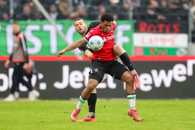 Torge Paetow SC Preussen Muenster and Jessic Ngankam Hannover 96 battle for the ball, 2 Bundesliga, Hannover 96 vs Preußen Münster, Heinz von Heiden Arena, January 26, 2025 in Hanover, Germany Photo by Marco Steinbrenner DeFodi Images Torge Paetow SC Preussen Muenster and Jessic Ngankam Hannover 96 battle for the ball, 2 Bundesliga, Hannover 96 vs Preußen Münster, Heinz von Heiden Arena, January 26, 2025 in Hanover, Germany Photo by Marco Steinbrenner DeFodi Images DFB DFL REGULATIONS PROHIBIT ANY USE OF PHOTOGRAPHS AS IMAGE SEQUENCES AND OR QUASI VIDEO Defodi 700 hannover muenster 20250126 057 Defodi-700 DFB DFL REGULATIONS PROHIBIT ANY USE OF PHOTOGRAPHS AS IMAGE SEQUENCES AND OR QUASI-VIDEO.