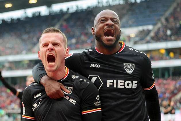 Florian Pick SC Preussen Muenster celebrates his teams second goal with David Kinsombi SC Preussen Muenster , 2 Bundesliga, Hannover 96 vs Preußen Münster, Heinz von Heiden Arena, January 26, 2025 in Hanover, Germany Photo by Marco Steinbrenner DeFodi Images Florian Pick SC Preussen Muenster celebrates after scoring his teams second goal with David Kinsombi SC Preussen Muenster , 2 Bundesliga, Hannover 96 vs Preußen Münster, Heinz von Heiden Arena, January 26, 2025 in Hanover, Germany Photo by Marco Steinbrenner DeFodi Images DFB DFL REGULATIONS PROHIBIT ANY USE OF PHOTOGRAPHS AS IMAGE SEQUENCES AND OR QUASI VIDEO Defodi 700 hannover muenster 20250126 075 Defodi-700 DFB DFL REGULATIONS PROHIBIT ANY USE OF PHOTOGRAPHS AS IMAGE SEQUENCES AND OR QUASI-VIDEO.