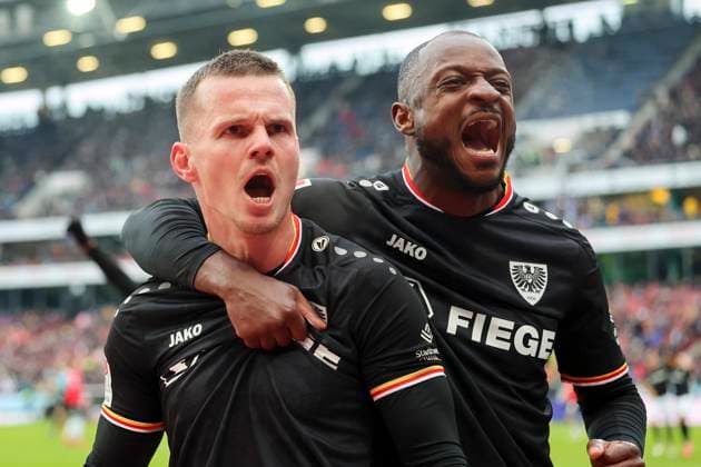 Florian Pick SC Preussen Muenster celebrates his teams second goal with David Kinsombi SC Preussen Muenster , 2 Bundesliga, Hannover 96 vs Preußen Münster, Heinz von Heiden Arena, January 26, 2025 in Hanover, Germany Photo by Marco Steinbrenner DeFodi Images Florian Pick SC Preussen Muenster celebrates after scoring his teams second goal with David Kinsombi SC Preussen Muenster , 2 Bundesliga, Hannover 96 vs Preußen Münster, Heinz von Heiden Arena, January 26, 2025 in Hanover, Germany Photo by Marco Steinbrenner DeFodi Images DFB DFL REGULATIONS PROHIBIT ANY USE OF PHOTOGRAPHS AS IMAGE SEQUENCES AND OR QUASI VIDEO Defodi 700 hannover muenster 20250126 076 Defodi-700 DFB DFL REGULATIONS PROHIBIT ANY USE OF PHOTOGRAPHS AS IMAGE SEQUENCES AND OR QUASI-VIDEO.