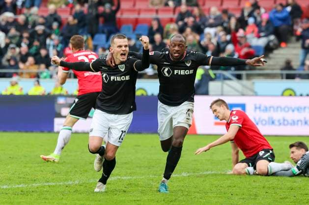 Florian Pick SC Preussen Muenster celebrates his teams second goal with David Kinsombi SC Preussen Muenster , 2 Bundesliga, Hannover 96 vs Preußen Münster, Heinz von Heiden Arena, January 26, 2025 in Hanover, Germany Photo by Marco Steinbrenner DeFodi Images Florian Pick SC Preussen Muenster celebrates after scoring his teams second goal with David Kinsombi SC Preussen Muenster , 2 Bundesliga, Hannover 96 vs Preußen Münster, Heinz von Heiden Arena, January 26, 2025 in Hanover, Germany Photo by Marco Steinbrenner DeFodi Images DFB DFL REGULATIONS PROHIBIT ANY USE OF PHOTOGRAPHS AS IMAGE SEQUENCES AND OR QUASI VIDEO Defodi 700 hannover muenster 20250126 077 Defodi-700 DFB DFL REGULATIONS PROHIBIT ANY USE OF PHOTOGRAPHS AS IMAGE SEQUENCES AND OR QUASI-VIDEO.