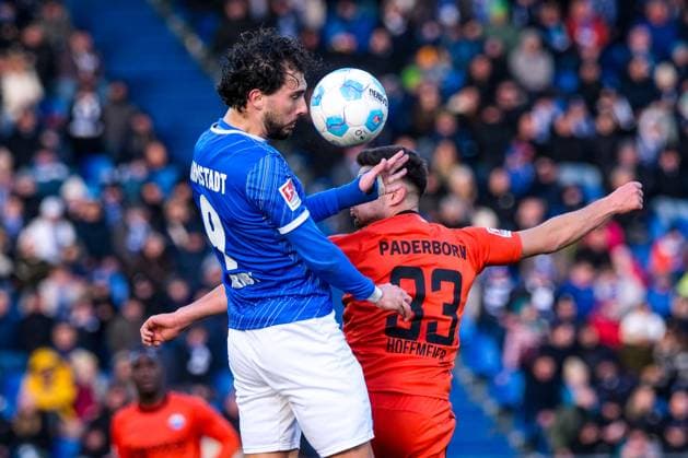 Fraser Hornby SV Darmstadt 98, 09 in duel with Marcel Hoffmeier SC Paderborn 07, 33 , GER, SV Darmstadt 98 vs SC Paderborn 07, Football, 2 Bundesliga, Matchday 19, Season 2024 2025, 26 01 2025 DFL REGULATIONS PROHIBIT ANY USE OF PHOTOGRAPHS as IMAGE SEQUENCES and or QUASI VIDEO GER, SV Darmstadt 98 vs SC Paderborn 07, Football, 2 Bundesliga, Matchday 19, Season 2024 2025, 26 01 2025 Darmstadt Copyright: xEibner-Pressefoto FlorianxWieganx EP_FWD