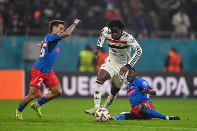 Kobbie Mainoo of Manchester United, ManU surrounded FCSB v Manchester United, UEFA Europa League, Group Stage, Football, The National Arena, Bucharest, Romania - 30 Jan 2025 EDITORIAL USE ONLY No use with unauthorised audio, video, data, fixture lists, club league logos or live services. Online in-match use limited to 120 images, no video emulation. No use in betting, games or single club league player publications. Copyright: xAlexxNicodim Shutterstockx 15122176cx