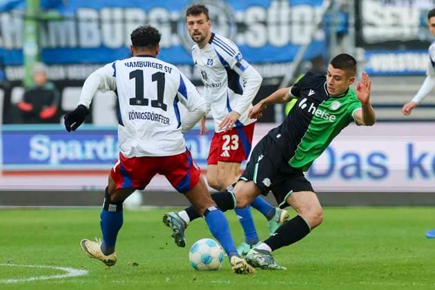 Ransford Yeboah Koenigsdoerffer Hamburger SV and Nicolo Tresoldi Hannover 96 battle for the ball, 2 Bundesliga, Hamburger SV vs Hannover 96, Volksparkstadion, February 2, 2025 in Hamburg, Germany Photo by Marco Steinbrenner DeFodi Images Ransford Yeboah Koenigsdoerffer Hamburger SV and Nicolo Tresoldi Hannover 96 battle for the ball, 2 Bundesliga, Hamburger SV vs Hannover 96, Volksparkstadion, February 2, 2025 in Hamburg, Germany Photo by Marco Steinbrenner DeFodi Images DFB DFL REGULATIONS PROHIBIT ANY USE OF PHOTOGRAPHS AS IMAGE SEQUENCES AND OR QUASI VIDEO Defodi 700 hsv hannover 20250102 029 Defodi-700 DFB DFL REGULATIONS PROHIBIT ANY USE OF PHOTOGRAPHS AS IMAGE SEQUENCES AND OR QUASI-VIDEO.