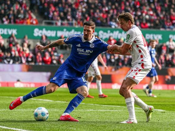 Janik Bachmann FC Schalke 04, 14 in duel against Mathias Olesen FC Köln FC Koeln, 47 , GER, FC Köln Koeln vs FC Schalke 04, Football, 2 Bundesliga, Matchday 21, Season 2024 2025, 09 02 2025, DFL DFB REGULATES PROHIBIT ANY USE OF PHOTOGRAPHS AS IMAGE SEQUENCES AND OR QUASI VIDEO, GER, FC Köln Koeln vs FC Schalke 04, Football, 2 Bundesliga, Matchday 21, Season 2024 2025, 09 02 2025 Köln Koeln Copyright: xGabrielxBoiax EP_EER