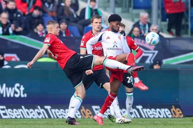 Nicolo Tresoldi Hannover 96 and Moritz Broni Kwarteng Fortuna Duesseldorf battle for the ball, 2 Bundesliga, Hannover 96 vs Fortuna Düsseldorf, Heinz von Heiden Arena, February 9, 2025 in Hanover, Germany Photo by Marco Steinbrenner DeFodi Images Nicolo Tresoldi Hannover 96 and Moritz Broni Kwarteng Fortuna Duesseldorf battle for the ball, 2 Bundesliga, Hannover 96 vs Fortuna Düsseldorf, Heinz von Heiden Arena, February 9, 2025 in Hanover, Germany Photo by Marco Steinbrenner DeFodi Images DFB DFL REGULATIONS PROHIBIT ANY USE OF PHOTOGRAPHS AS IMAGE SEQUENCES AND OR QUASI VIDEO Defodi 700 hann dus 20250209 029 Defodi-700 DFB DFL REGULATIONS PROHIBIT ANY USE OF PHOTOGRAPHS AS IMAGE SEQUENCES AND OR QUASI-VIDEO.