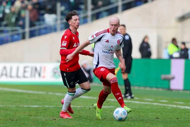 Jannik Rochelt Hannover 96 and Valgeir Lunddal Fortuna Duesseldorf battle for the ball, 2 Bundesliga, Hannover 96 vs Fortuna Duesseldorf, Heinz von Heiden Arena, February 09, 2025 in Hanover, Germany Photo by Marco Steinbrenner DeFodi Images Jannik Rochelt Hannover 96 and Valgeir Lunddal Fortuna Duesseldorf battle for the ball, 2 Bundesliga, Hannover 96 vs Fortuna Düsseldorf, Heinz von Heiden Arena, February 9, 2025 in Hanover, Germany Photo by Marco Steinbrenner DeFodi Images DFB DFL REGULATIONS PROHIBIT ANY USE OF PHOTOGRAPHS AS IMAGE SEQUENCES AND OR QUASI VIDEO Defodi 700 hann dus 20250209 038 Defodi-700 DFB DFL REGULATIONS PROHIBIT ANY USE OF PHOTOGRAPHS AS IMAGE SEQUENCES AND OR QUASI-VIDEO.