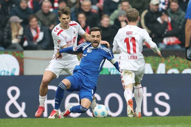 GER, 2 FBL, 1 FC Koeln vs FC Schalke 04 09 02 2025, Rheinenergie Stadion, Koeln, GER, 2 FBL, 1 FC Koeln vs FC Schalke 04, in the picture Kenan Karaman Schalke 19 , in a duel against Joël Schmied Koeln 2 , nordphotoxGmbHx xMeuter nph00351