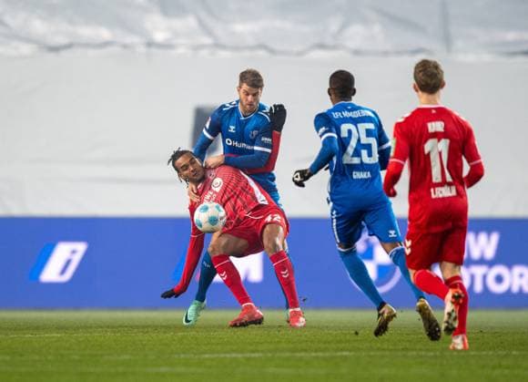 Football, Men, Season 2024 2025, 2 Bundesliga 22 Matchday , 1 FC Magdeburg 1 FC Köln, v l Damion Downs 1 FC Köln , Marcus Mathisen 1 FC Magdeburg , Silas Gnaka 1 FC Magdeburg , Florian Kainz 1 FC Köln , 14 02 2025, Copyright: xSebastianxRäppold MatthiasxKochx