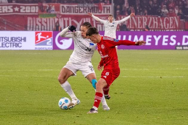 Derry Scherhant Hertha BSC, 39 vs Giovanni Haag Fortuna Duesseldorf, 06 , GER Fortuna Duesseldorf vs Hertha BSC, Soccer, 2 Bundesliga, Matchday 22, Season 2024 2025, 15 02 2025 DFB DFL REGULATIONS PROHIBIT ANY USE OF PHOTOGRAPHS AS IMAGE SEQUENCES AND OR QUASI VIDEO, GER Fortuna Duesseldorf vs Hertha BSC, Football, 2 Bundesliga, Matchday 22, Season 2024 2025, 15 02 2025 Duesseldorf Copyright: xEibner-Pressefoto FabianxFriesex EP_FFE