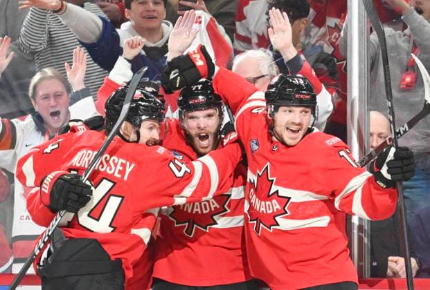 Eishockey, 4 Nations Face-Off in Montreal, Kanada - USA February 15, 2025, Montreal, Pq, Canada: Canada s Connor McDavid (97) celebrates with teammates Josh Morrissey (44) and Sam Reinhart (13) after scoring against the United States during first period 4 Nations Face-Off hockey action in Montreal, Saturday, February 15, 2025. Sam Reinhart, Connor McDavid, Josh Morrissey, - ZUMAc35_ 20250215_zaf_c35_223 Copyright: xGrahamxHughesx