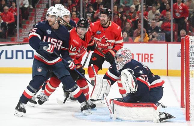 Eishockey, 4 Nations Face-Off in Montreal, Kanada - USA February 15, 2025, Montreal, Pq, Canada: Canada s Mitch Marner (16) and Mark Stone (61) move in on United States goaltender Connor Hellebuyck (37) as United States Noah Hanifin (15) defends during third period 4 Nations Face-Off hockey action in Montreal, Saturday, February 15, 2025. Connor Hellebuyck, Mitch Marner, Mark Stone, Noah Hanifin, - ZUMAc35_ 20250215_zaf_c35_262 Copyright: xGrahamxHughesx