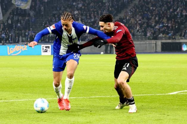 DEU, DFL, 2 FBL, Hertha BSC vs 1 FC Nuernberg, 21 02 2025, Berliner Olympiastadion, Berlin, DEU, DFL, 2 FBL, Hertha BSC vs 1 FC Nuernberg, im Bild Derry Scherhant Hertha BSC Berlin 39 , Yilmaz, Berkay 1 FC Nuernberg 21 DFL regulations prohibit any use of Photographs as image sequences and or quasi video Foto Juergen Engler nordphoto GmbH nordphotoxGmbHx xEngler nph00076