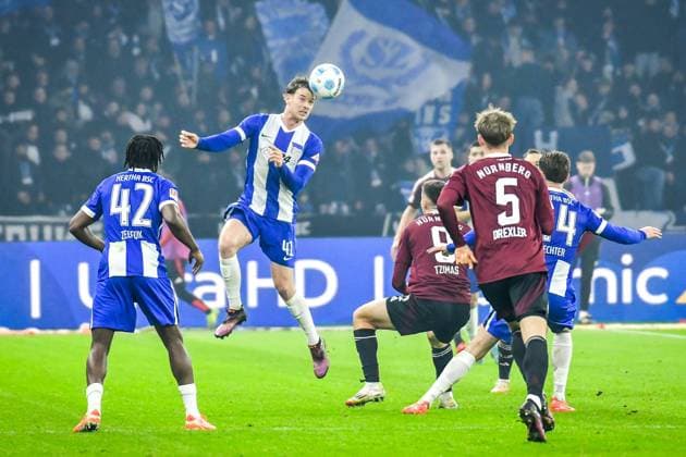 Soccer 2 Bundesliga, Hertha BSC Berlin 1 FC Nuremberg 21 02 2025, xdanx, Soccer 2 Bundesliga, Hertha BSC Berlin 1 FC Nuremberg v l Deyovaisio Zeefuik Hertha BSC 42 ,Linus Gechter Hertha BSC 44 ,Stefanos Tzimas 1 FC Nuernberg 9 ,duel, duel, fight, tackle DFL DFB REGULATIONS PROHIBIT ANY USE OF PHOTOGRAPHS as IMAGE SEQUENCES and or QUASI VIDEO Daniel Lakomski Mix1 Berlin Olympiastadion Berlin Germany DEU Copyright: xDanielxLakomskix