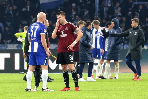 DEU, DFL, 2 FBL, Hertha BSC vs 1 FC Nuernberg, 21 02 2025, Berliner Olympiastadion, Berlin, DEU, DFL, 2 FBL, Hertha BSC vs 1 FC Nuernberg, im Bild Toni Leistner Hertha BSC Berlin 37 , Knoche, Robin 1 FC Nuernberg 31 DFL regulations prohibit any use of Photographs as image sequences and or quasi video Foto Juergen Engler nordphoto GmbH nordphotoxGmbHx xEngler nph00076