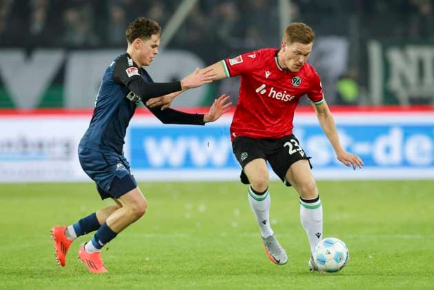 Casper Terho SC Paderborn 07 and Marcel Halstenberg Hannover 96 battle for the ball, 2 Bundesliga, Hannover 96 vs SC Paderborn 07, Heinz von Heiden Arena, February 22, 2025 in Hanover, Germany Photo by Marco Steinbrenner DeFodi Images Casper Terho SC Paderborn 07 and Marcel Halstenberg Hannover 96 battle for the ball, 2 Bundesliga, Hannover 96 vs SC Paderborn 07, Heinz von Heiden Arena, February 22, 2025 in Hanover, Germany Photo by Marco Steinbrenner DeFodi Images DFB DFL REGULATIONS PROHIBIT ANY USE OF PHOTOGRAPHS AS IMAGE SEQUENCES AND OR QUASI VIDEO