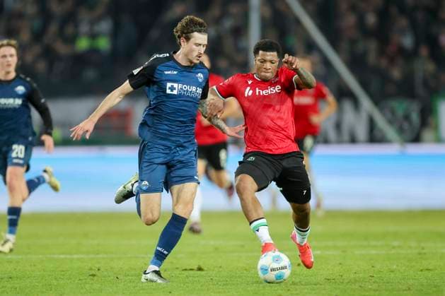 Calvin Brackelmann SC Paderborn 07 and Jessic Ngankam Hannover 96 battle for the ball, 2 Bundesliga, Hannover 96 vs SC Paderborn 07, Heinz von Heiden Arena, February 22, 2025 in Hanover, Germany Photo by Marco Steinbrenner DeFodi Images Calvin Brackelmann SC Paderborn 07 and Jessic Ngankam Hannover 96 battle for the ball, 2 Bundesliga, Hannover 96 vs SC Paderborn 07, Heinz von Heiden Arena, February 22, 2025 in Hanover, Germany Photo by Marco Steinbrenner DeFodi Images DFB DFL REGULATIONS PROHIBIT ANY USE OF PHOTOGRAPHS AS IMAGE SEQUENCES AND OR QUASI VIDEO