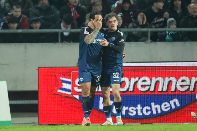 Adriano Grimaldi SC Paderborn 07 celebrates his goal for 1 1 with Aaron Zehnter SC Paderborn 07 , 2 Bundesliga, Hannover 96 vs SC Paderborn 07, Heinz von Heiden Arena, February 22, 2025 in Hanover, Germany Photo by Marco Steinbrenner DeFodi Images Adriano Grimaldi SC Paderborn 07 celebrates after scoring his teams first goal with Aaron Zehnter SC Paderborn 07 , 2 Bundesliga, Hannover 96 vs SC Paderborn 07, Heinz von Heiden Arena, February 22, 2025 in Hanover, Germany Photo by Marco Steinbrenner DeFodi Images DFB DFL REGULATIONS PROHIBIT ANY USE OF PHOTOGRAPHS AS IMAGE SEQUENCES AND OR QUASI VIDEO