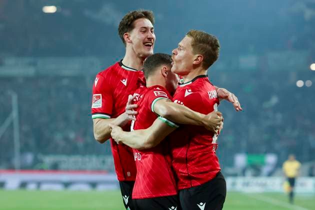 Marcel Halstenberg Hannover 96 celebrates his 1-0 goal with Phil Neumann Hannover 96 and Enzo Leopold Hannover 96 , 2 Bundesliga, Hannover 96 vs SC Paderborn 07, Heinz von Heiden Arena, February 22, 2025 in Hanover, Germany Photo by Marco Steinbrenner DeFodi Images Marcel Halstenberg Hannover 96 celebrates after scoring his teams first goal with Phil Neumann Hannover 96 and Enzo Leopold Hannover 96 , 2 Bundesliga, Hannover 96 vs SC Paderborn 07, Heinz von Heiden Arena, February 22, 2025 in Hanover, Germany Photo by Marco Steinbrenner DeFodi Images DFB DFL REGULATIONS PROHIBIT ANY USE OF PHOTOGRAPHS AS IMAGE SEQUENCES AND OR QUASI VIDEO