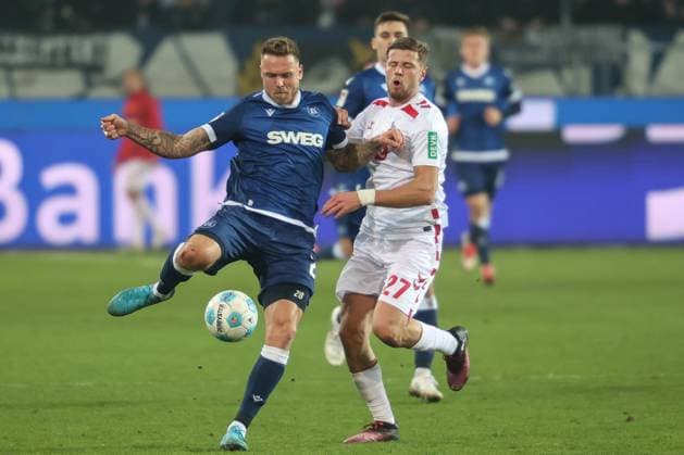 Marcel Franke Karlsruher SC, 28 in duel with Imad Rondic 1 FC Koeln, 27 , Karlsruher SC vs 1 FC Koeln Soccer, 2 Bundesliga, Matchday 24, 2024 2025, 01 03 2025, DFL REGULATES PROHIBIT ANY USE OF PHOTOGRAPHS AS IMAGE SEQUENCES AND OR QUASI VIDEO, Karlsruher SC vs 1 FC Koeln Soccer, 2 Bundesliga, Matchday 24, 2024 2025, 01 03 2025 Karlsruhe Copyright: xEibner-Pressefoto JanxPrihodax EP_JPA