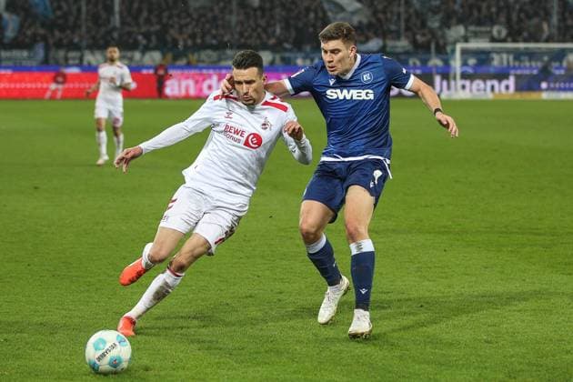 Dejan Ljubicic 1 FC Koeln, 07 vs Marcel Beifus Karlsruher SC, 04 , Karlsruher SC vs 1 FC Koeln Football, 2 Bundesliga, 24 Matchday, 2024 2025, 01 03 2025, DFL REGULATES PROHIBIT ANY USE OF PHOTOGRAPHS AS IMAGE SEQUENCES AND OR QUASI VIDEO, Karlsruher SC vs 1 FC Koeln Football, 2 Bundesliga, 24 Matchday, 2024 2025, 01 03 2025 Karlsruhe Copyright: xEibner-Pressefoto JanxPrihodax EP_JPA