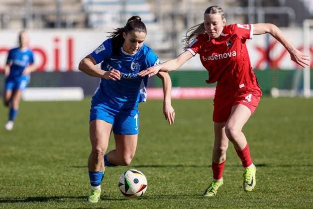 from left Sarah Preuß Preuss, SV Meppen, 11 and Mia Lena Maas SC Freiburg II, 4 in a duel, dynamic, action, action, game scene, THE DFB REGULATIONS PROHIBIT ANY USE OF PHOTOGRAPHS AS IMAGE SEQUENCES AND OR QUASI VIDEO , 02 03 2025, Meppen Germany , Football, 2 Womens Bundesliga, SV Meppen SC Freiburg II xobx