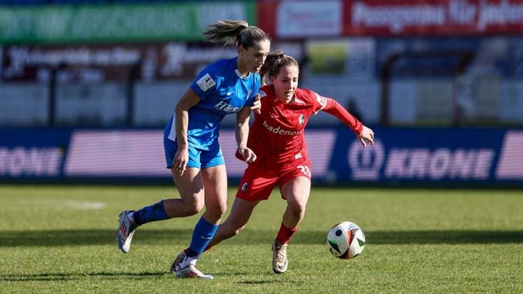 from left Jeske Steenwijk SV Meppen, 2 and Victoria Wunderlich SC Freiburg II, 20 in a duel, dynamic, action, action, game scene, THE DFB REGULATIONS PROHIBIT ANY USE OF PHOTOGRAPHS AS IMAGE SEQUENCES AND OR QUASI VIDEO , 02 03 2025, Meppen Germany , Football, 2 Womens Bundesliga, SV Meppen SC Freiburg II xobx