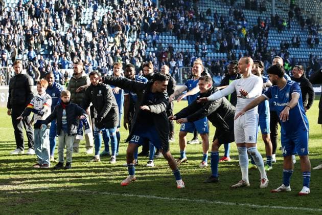 from l Livan Burcu 1 FC Magdeburg,29 , Martijn Kaars 1 FC Magdeburg,9 , goalkeeper Dominik Reimann 1 FC Magdeburg,1 , Abu Bekir Ömer El Zein 1 FC Magdeburg,14 celebrate the victory in front of the fan block 2 Soccer Bundesliga Season 2024 2025 1 FC Magdeburg vs SV Darmstadt 98 at the Avnet Arena in Magdeburg Action,Soccer,Man,Men,Germany,02 03 2025