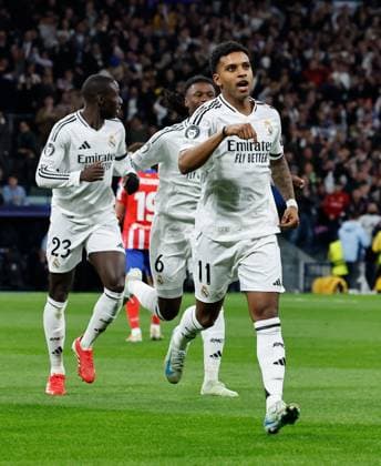 Rodrygo of Real Madrid celebrates scoring the opening goal Real Madrid v Atletico Madrid , UEFA Champions League, Round of 16, First Leg, Football, Santiago Bernabeu, Madrid, Spain - 04 Mar 2025 EDITORIAL USE ONLY No use with unauthorised audio, video, data, fixture lists, club league logos or live services. Online in-match use limited to 120 images, no video emulation. No use in betting, games or single club league player publications. Copyright: xRubenxAlbarran Shutterstockx 15178301ag