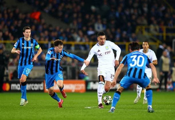 Maxim De Cuyper of Club Brugge and Morgan Rogers of Aston Villa. Club Brugge v Aston Villa, UEFA Champions League, Round of 16, First Leg, Football, Jan Breydel Stadium, Brugge, Belgium - 04 Mar 2025 EDITORIAL USE ONLY No use with unauthorised audio, video, data, fixture lists, club league logos or live services. Online in-match use limited to 120 images, no video emulation. No use in betting, games or single club league player publications. Copyright: xJamesxMarsh Shutterstockx 15176976ck