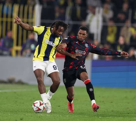 Dujon Sterling of Rangers in action with Allan Saint-Maximin of Fenerbahce during the Europa League last 16 match at the Sükrü Saracoglu Stadium, Istanbul. Fenerbahce v Rangers, UEFA Europa League, Football, Sukru Saracoglu Stadium, Istanbul, Turkey - 06 Mar 2025 EDITORIAL USE ONLY No use with unauthorised audio, video, data, fixture lists, club league logos or live services. Online in-match use limited to 120 images, no video emulation. No use in betting, games or single club league player publications. Copyright: xO Rourke RangersxFC Shutterstockx 15182250ir