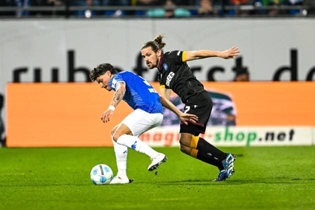 Guille Bueno SV Darmstadt 98, 03 in duel with Sebastian Jung Karlsruhe SC, 02 , GER, SV Darmstadt 98 vs Karlsruher SC, Football, 25 Matchday, Season 2024 2025, 07 03 2025 DFL REGULATIONS PROHIBIT ANY USE OF PHOTOGRAPHS as IMAGE SEQUENCES and or QUASI VIDEO GER, SV Darmstadt 98 vs Karlsruher SC, Football, 25 Matchday, Season 2024 2025, 07 03 2025 Darmsatdt Copyright: xEibner-Pressefoto FlorianxWieganx EP_FWD