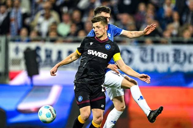 Marvin Wanitzek Karlsruher SC, 10 in duel with Sergio Lopez SV Darmstadt 98, 02 , GER, SV Darmstadt 98 vs Karlsruher SC, Soccer, 25 Matchday, Season 2024 2025, 07 03 2025 DFL REGULATIONS PROHIBIT ANY USE OF PHOTOGRAPHS as IMAGE SEQUENCES and or QUASI VIDEO GER, SV Darmstadt 98 vs Karlsruher SC, Soccer, 25 Matchday, Season 2024 2025, 07 03 2025 Darmsatdt Copyright: xEibner-Pressefoto FlorianxWieganx EP_FWD