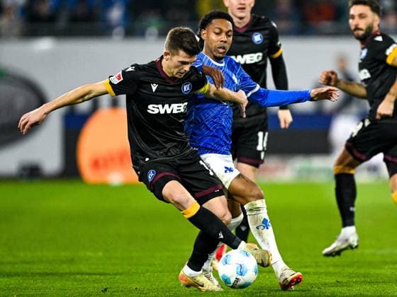 Marvin Wanitzek Karlsruher SC, 10 in duel with Jean Paul Boetius SV Darmstadt 98, 10 , GER, SV Darmstadt 98 vs Karlsruher SC, Soccer, 25 Matchday, Season 2024 2025, 07 03 2025 DFL REGULATIONS PROHIBIT ANY USE OF PHOTOGRAPHS as IMAGE SEQUENCES and or QUASI VIDEO GER, SV Darmstadt 98 vs Karlsruher SC, Soccer, 25 Matchday, Season 2024 2025, 07 03 2025 Darmsatdt Copyright: xEibner-Pressefoto FlorianxWieganx EP_FWD