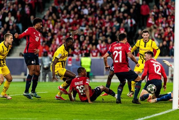 UEFA Champions League, LOSC Lille Borussia Dortmund 12 03 2025 Battle in the penalty area Serhou Guirassy Borussia Dortmund, 9 , Bafode Diakite LOSC Lille, 18 , Benjamin Andre LOSC Lille, 21 , Thomas Meunier LOSC Lille, 12 , Lucas Chevalier LOSC Lille, 30 UEFA Champions League round of 16 second leg, LOSC Lille Borussia Dortmund Lille, Stade Pierre Mauroy on 12 03 2025 Copyright: xBEAUTIFULxSPORTS Wunderlx