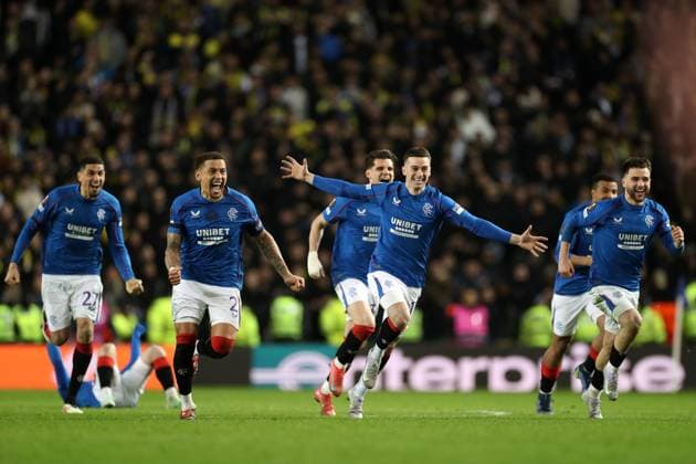 Rangers players celebrate after winning the penalty shoot out during the Europa League last 16 match at Ibrox Stadium, Glasgow. Rangers v Fenerbahce, UEFA Europa League, Round of 16, Second Leg, Football, Ibrox Stadium, Glasgow, Scotland, UK - 13 Mar 2025 EDITORIAL USE ONLY No use with unauthorised audio, video, data, fixture lists, club league logos or live services. Online in-match use limited to 120 images, no video emulation. No use in betting, games or single club league player publications. Copyright: xO Rourke RangersxFC Shutterstockx 15196580ah