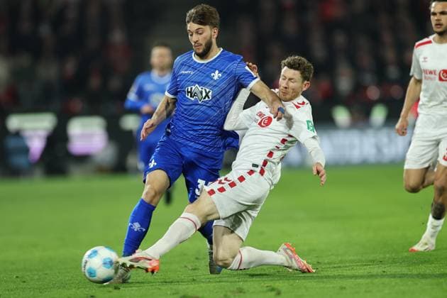 GER, 2 FBL, 1 FC Koeln vs SV Darmstadt 98 15 03 2025, Rheinenergie Stadion, Koeln, GER, 2 FBL, 1 FC Koeln vs SV Darmstadt 98, in the picture Killian Corredor Darmstadt 98 34 , in a duel against Florian Kainz FC Koeln 11 , nordphotoxGmbHx xMeuter nph00351
