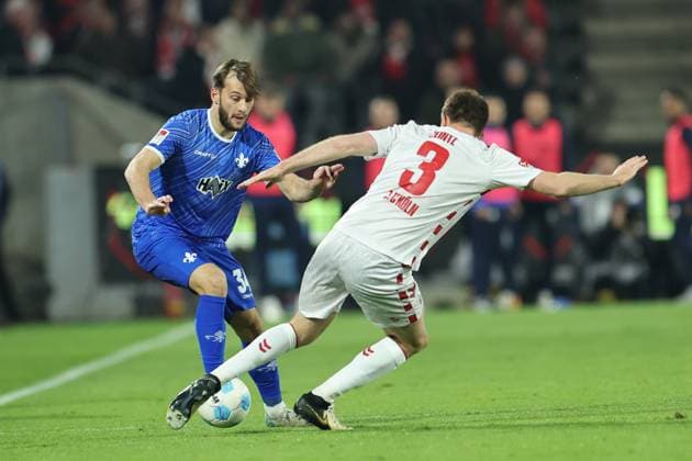 GER, 2 FBL, 1 FC Koeln vs SV Darmstadt 98 15 03 2025, Rheinenergie Stadion, Koeln, GER, 2 FBL, 1 FC Koeln vs SV Darmstadt 98, in the picture Killian Corredor Darmstadt 98 34 , in a duel against Dominique Heintz FC Koeln 3 , nordphotoxGmbHx xMeuter nph00351