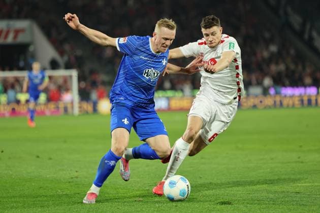 GER, 2 FBL, 1 FC Koeln vs SV Darmstadt 98 15 03 2025, Rheinenergie Stadion, Koeln, GER, 2 FBL, 1 FC Koeln vs SV Darmstadt 98, in the picture Eric Martel FC Koeln 6 , in a duel against Isac Lidberg Darmstadt 98 7 , nordphotoxGmbHx xMeuter nph00351