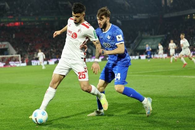 GER, 2 FBL, 1 FC Koeln vs SV Darmstadt 98 15 03 2025, Rheinenergie Stadion, Koeln, GER, 2 FBL, 1 FC Koeln vs SV Darmstadt 98, in the picture Jusuf Gazibegovic Koeln 25 , in a duel against Killian Corredor Darmstadt 98 34 , nordphotoxGmbHx xMeuter nph00351