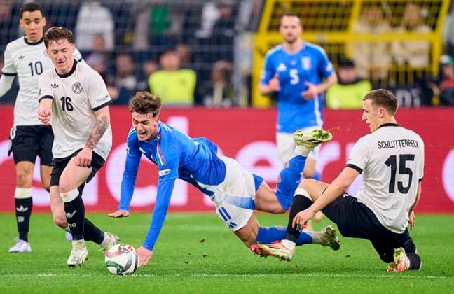 Nico Schlotterbeck, DFB 15 compete for the ball, tackling, duel, header, zweikampf, action, fight against Daniel Maldini, ITA 11 in the UEFA Nations League 2025 match GERMANY - ITALY in Season 2024 2025 at Mar 23, 2025 in Dortmund, Germany.