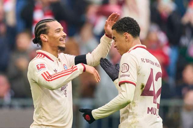 Leroy SANE, FCB 10 celebrates his goal, happy, laugh, celebration, 2-1 with Jamal MUSIALA, FCB 42 in the match FC BAYERN MUENCHEN - FC ST. PAULI 3-2 on Mar 29, 2025 in München, Germany. Season 2024 2025, 1.Bundesliga, FCB,, München, matchday 27, 27.Spieltag