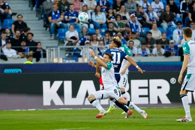 Enzo Leopold Hannover 96, 08 and Bambase Conte Karlsruher SC, 31 in duel , Germany, Soccer, 2 Bundesliga, Matchday, 2024 2025, Karlsruher SC vs Hannover 96, 04 04 2025, BBBank Wildpark, Karlsruhe, Germany DFL REGULATIONS PROHIBIT ANY USE OF PHOTOGRAPHS AS IMAGE SEQUENCES AND OR QUASI VIDEO Karlsruhe BBBank Wildpark Baden Württemberg Germany Copyright: xGrantxHubbsx