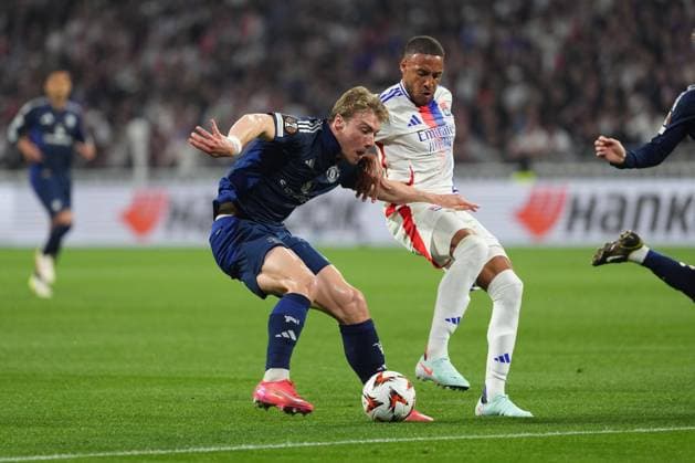 Rasmus Hojlund of Man Utd and Corentin Tolisso of Lyon Olympique Lyonnais v Manchester United, ManU UEFA Europa League, Quarter Final, First Leg, Football, Groupama Stadium, Lyon, France - 10 Apr 2025 EDITORIAL USE ONLY No use with unauthorised audio, video, data, fixture lists, club league logos or live services. Online in-match use limited to 120 images, no video emulation. No use in betting, games or single club league player publications. Copyright: xDavexWinter Shutterstockx 15243617ap