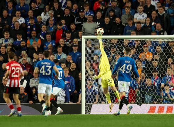 Liam Kelly of Rangers saves a shot on target during UEFA Europa League Quarter-Final first leg match at Ibrox Stadium, Glasgow. Rangers v Athletic Bilbao, UEFA Europa League, Quarter Final, First Leg, Football, Ibrox Stadium, Glasgow, Scotland, UK - 10 Apr 2025 EDITORIAL USE ONLY No use with unauthorised audio, video, data, fixture lists, club league logos or live services. Online in-match use limited to 120 images, no video emulation. No use in betting, games or single club league player publications. Copyright: xRangersxFC Shutterstockx 15247737be