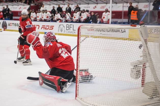 Laure Meriguet of Switzerland, left, and goalkeeper Andrea Braendli of Switzerland in action during the Ice hockey, Eishockey IIHF Women s World Championship, WM, Weltmeisterschaft Group A, match Switzerland vs Canada, Ceske Budejovice, Czech Republic, April 11, 2025. (CTKxPhoto PetrxSkrivanek) CTKPhotoP2025041106485 CTKPhotoP2025041106485