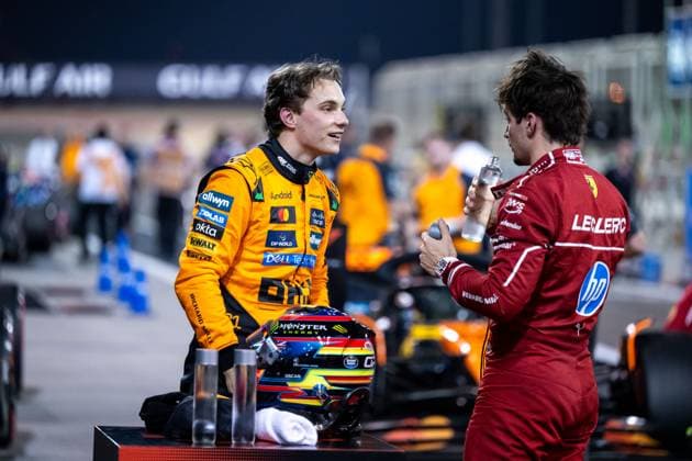 Oscar Piastri McLaren Formula 1 Team, Australia, 81 celebrates first place and pole position at Parc Ferme, next to Charles Leclerc Scuderia Ferrari HP, Monaco, 16 , BAH, Formula 1 World Championship, Gulf Air Grand Prix of Bahrain, Bahrain International Circuit, Qualifying, 2025 season, 12 04 2025 BAH, Formula 1 World Championship, Gulf Air Grand Prix of Bahrain, Bahrain International Circuit, Qualifying, 2025 season, 12 04 2025 Sakhir Copyright: xEibner-Pressefoto Memmlerx EP_MMR