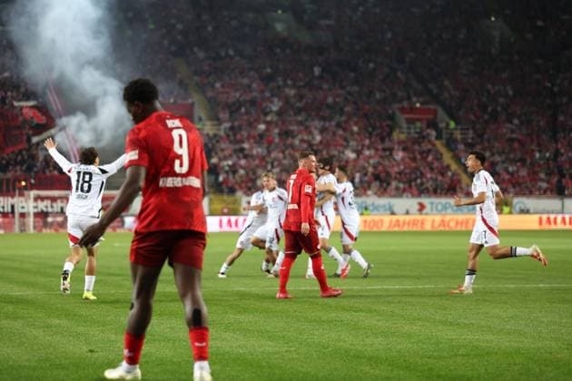 12 04 2025, xrekx, Fußball 2 Bundesliga, 1 FC Kaiserslautern 1 FC Nürnberg v l Torjubel nach dem Tor zum 0 1 celebrating the goal celebrate durch Fabio Gruber 1 FC Nuernberg Rafael Lubach 1 FC Nuernberg Ragnar Ache 1 FC Kaiserslautern Marlon Ritter 1 FC Kaiserslautern enttaeuscht, disappointed, looks disappointed, sad, frustrated, dejected, disappointed, sad, frustrated DFL DFB REGULATIONS PROHIBIT ANY USE OF PHOTOGRAPHS as IMAGE SEQUENCES and or QUASI VIDEO Kaiserslautern