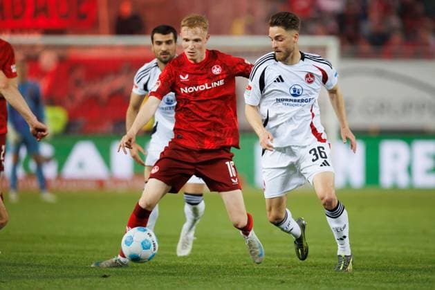 Tim Breithaupt 1 FC Kaiserslautern in duel with Lukas Schleimer 1 FC Nuernberg , 1 FC Kaiserslautern vs 1 FC Nuernberg, Soccer, 2 Bundesliga, Season 2024 2025, Matchday 29, 12 04 2025 1 FC Kaiserslautern vs 1 FC Nuernberg, Soccer, 2 Bundesliga, Season 2024 2025, Matchday 29, 12 04 2025 Copyright: xEibner-Pressefoto AlexanderxNeisx EP_ANS