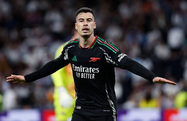 Gabriel Martinelli of Arsenal celebrates scoring a goal to make the score 1-2 Real Madrid v Arsenal, UEFA Champions League, Quarter-Finals, 2nd Leg, Football, Santiago Bernabu Stadium, Madrid, Spain - 16 Apr 2025 EDITORIAL USE ONLY No use with unauthorised audio, video, data, fixture lists, club league logos or live services. Online in-match use limited to 120 images, no video emulation. No use in betting, games or single club league player publications. Copyright: xRubenxAlbarran Shutterstockx 15253938dd
